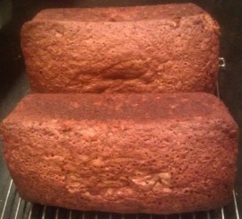 After cooling for 20 or 30 minutes on one side, I generally turn the loaves over so they don't get lopsided as they cool.