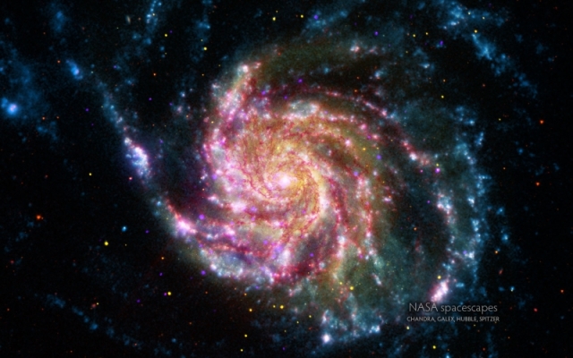 Image of the galaxy M101 from NASA's Spitzer and Hubble Space Telescopes, NASA's Chandra X-ray Observatory, and NASA's Galaxy Evolution Explorer Photo: NASA